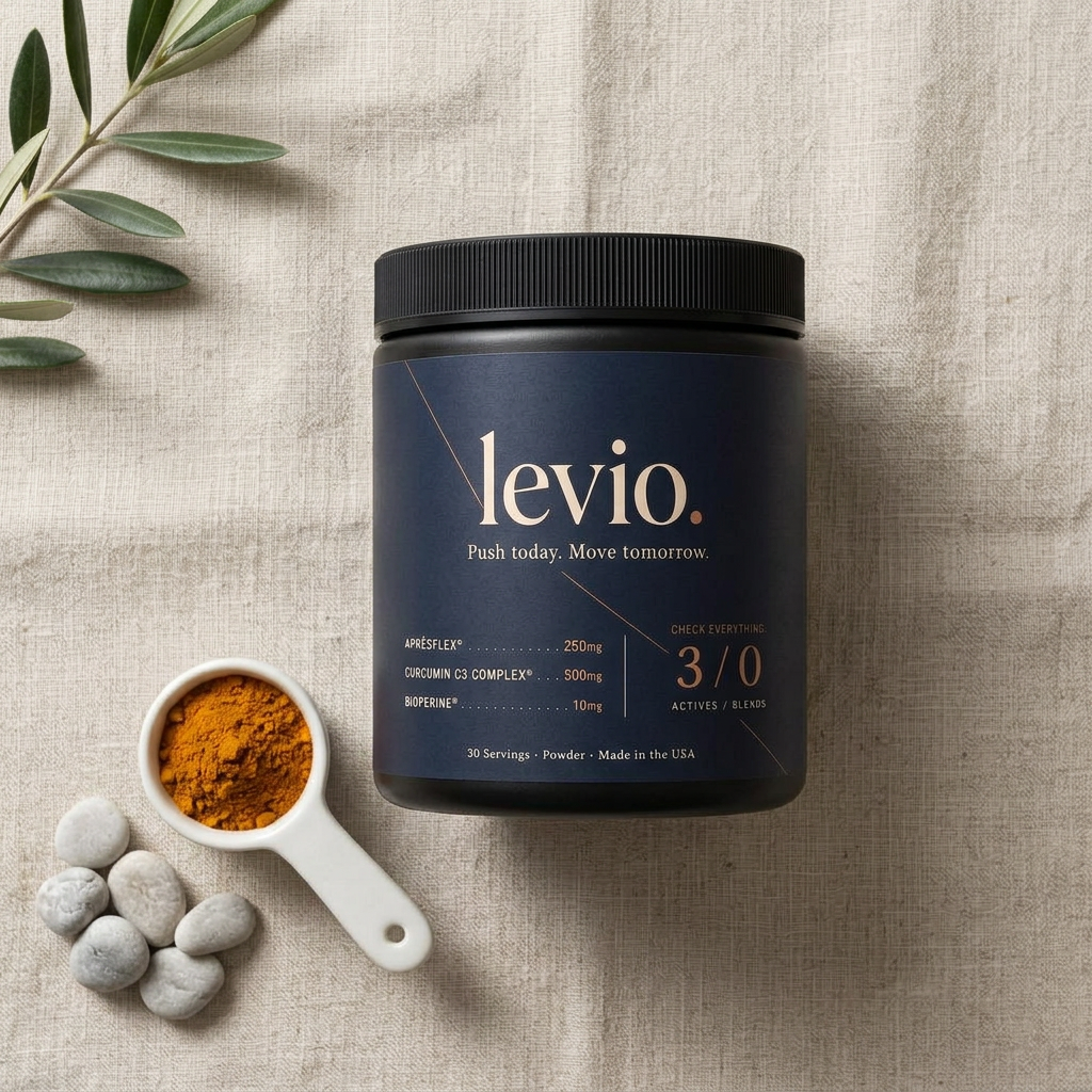 Overhead flat lay of the Levio tub with turmeric root and peppercorns